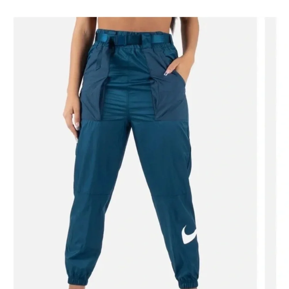 Nike Track Pants Teal Blue Polyester Joggers White Swoosh Elastic Cuffs